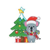 schattig koala stripfiguur met kerstlamp vector