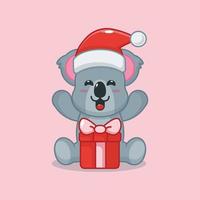 schattige koala blij met kerstcadeau vector