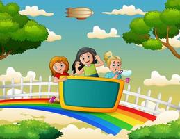 gelukkige drie meisjes over de kleurrijke regenboog vector