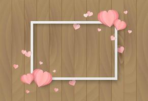 De houten achtergrond van de valentijnskaartendag met hartvorm en wit kader vector