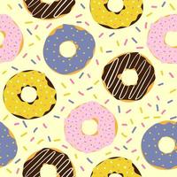 kleurrijk hand getrokken donuts naadloos patroon. vector