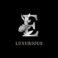 letter e bloemblaadjes decoratie voor bruiloft, schoonheidsverzorging logo, personal branding identiteit, visagist of een ander koninklijk merk en bedrijf. luxe goud en zilver kleurstaal in dummy tekst vector