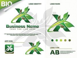 beginletter x met groen blad logo ontwerp vector