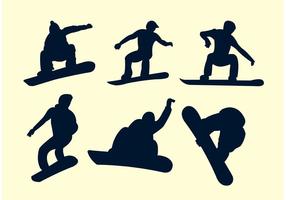 Silhouetten van snowboarders vector