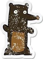 retro noodlijdende sticker van een cartoon zwarte beer vector