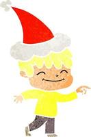 retro cartoon van een gelukkige jongen die een kerstmuts draagt vector