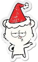 verveelde ijsbeer verontruste sticker cartoon van een dragende kerstmuts vector