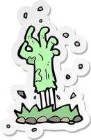 sticker van een cartoon zombiehand die uit de grond oprijst vector