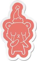 huilende ijsbeer cartoon sticker van een dragende kerstmuts vector