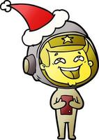 gradiëntcartoon van een lachende astronaut die een kerstmuts draagt vector