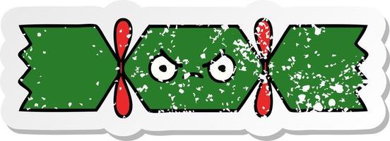 verontruste sticker van een schattige cartoon-kerstkraker vector