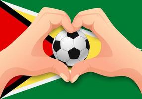 guyana voetbal en hand hartvorm vector