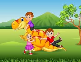 cartoon klein kind spelen met een dinosaurus in de jungle vector