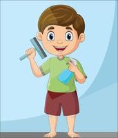 cartoon kleine jongen met spray en rakel vector