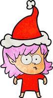 getextureerde cartoon van een elfenmeisje dat een kerstmuts draagt vector