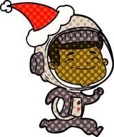 vrolijke stripboekstijlillustratie van een astronaut die een kerstmuts draagt vector