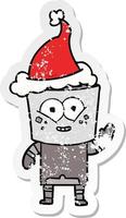 vrolijke, verontruste stickercartoon van een robot die hallo zwaait met een kerstmuts vector