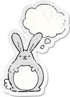 cartoon konijn en gedachte bel als een versleten versleten sticker vector