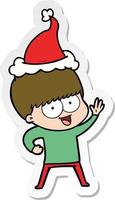 vrolijke sticker cartoon van een jongen met een kerstmuts vector