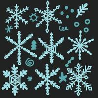 sneeuwvlokken handgetekende set met doodles vector