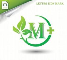 letter m met groen blad vector sjabloon