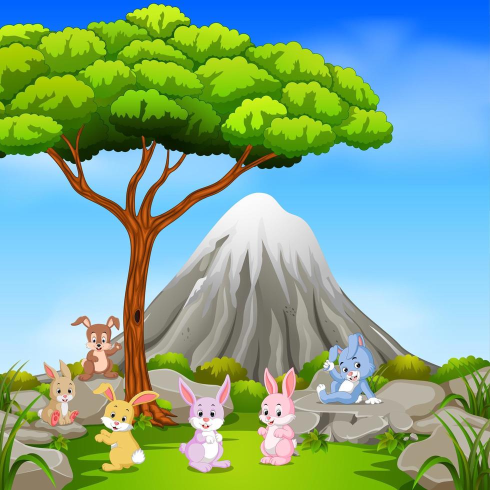 Viele Kaninchen sitzen auf dem Felsen mit Bergszene vektor