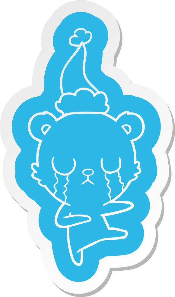 gråtande isbjörn tecknad klistermärke av en bärande tomtehatt vektor