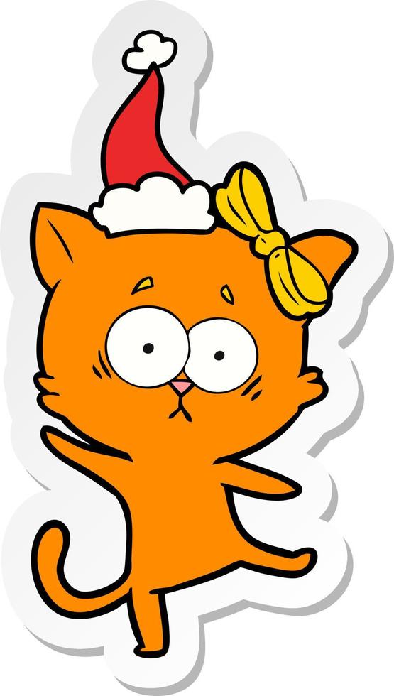 Aufkleberkarikatur einer Katze, die Sankt-Hut trägt vektor