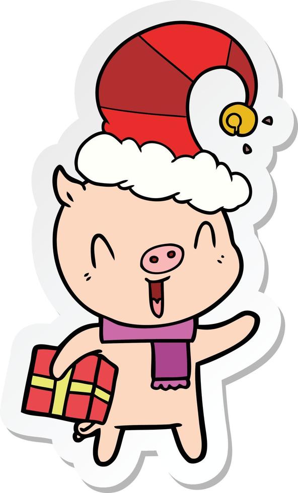 klistermärke av en glad tecknad gris med julklapp vektor