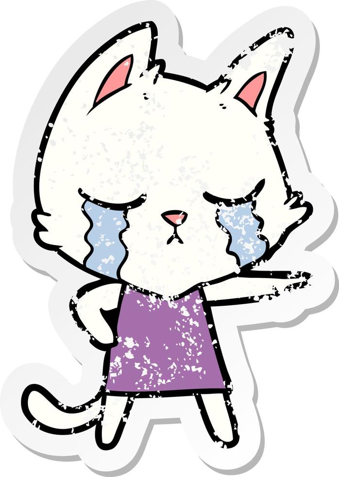bedrövad klistermärke av en gråt tecknad serie katt i klänning pekande vektor