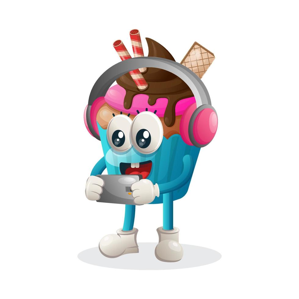 süßes cupcake-maskottchen, das spielmobil spielt und kopfhörer trägt vektor