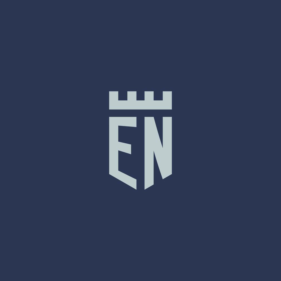 en-Logo-Monogramm mit Festungsschloss und Schildstil-Design vektor