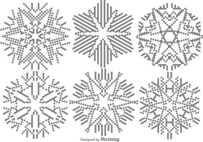 Pixelerade snöflingor uppsättning vektor