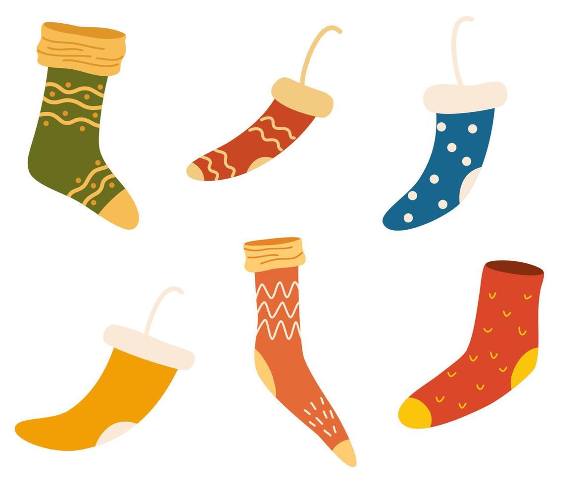 gestrickte Socken-Set. Weihnachtsdekoration. dekor für haus, innenraum, dekorationen und weihnachten. hand gezeichnete illustration lokalisiert auf dem weißen hintergrund vektor