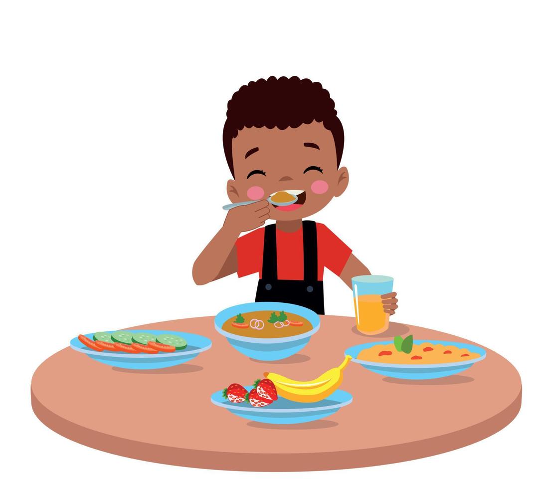 söt liten pojke äter på de middag tabell vektor