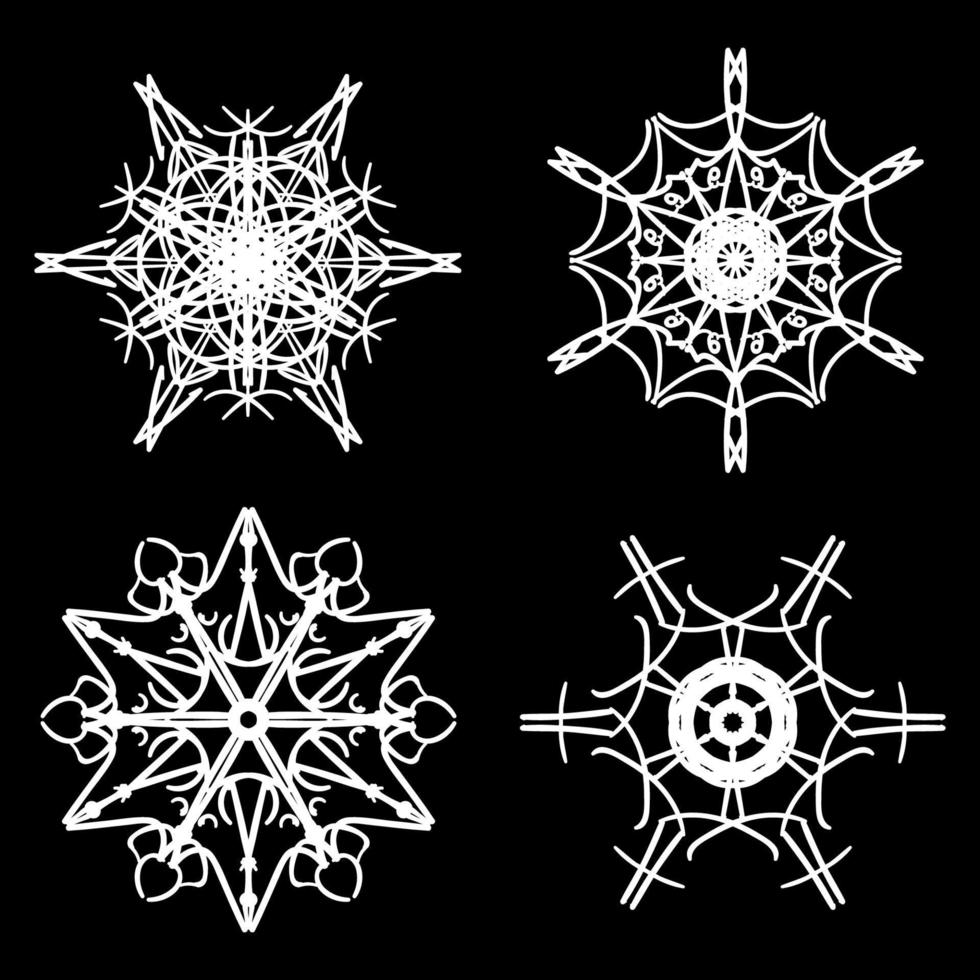 uppsättning av fyra skön dragen snöflinga silhuetter vektor