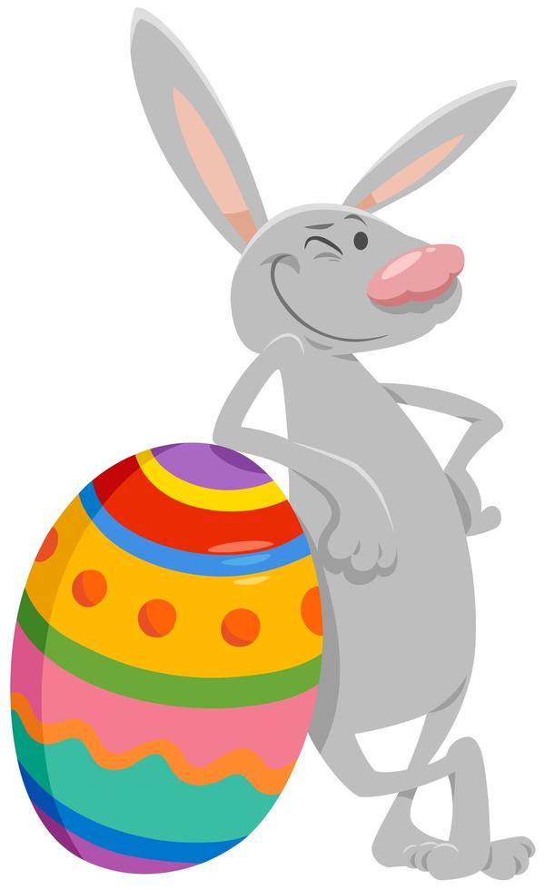 Cartoon-Osterhase mit großem farbigem Ei vektor