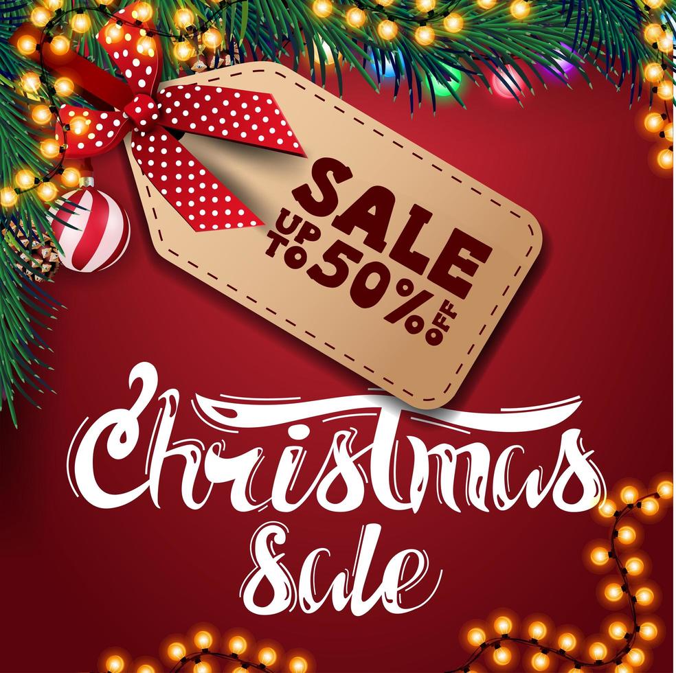 Weihnachtsverkauf, bis zu 50 Rabatt, rotes Rabattbanner mit Girlande, Weihnachtskugeln und Weihnachtsbaumzweigen vektor
