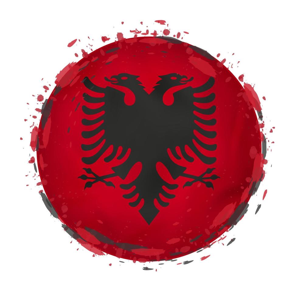 runden Grunge Flagge von Albanien mit spritzt im Flagge Farbe. vektor