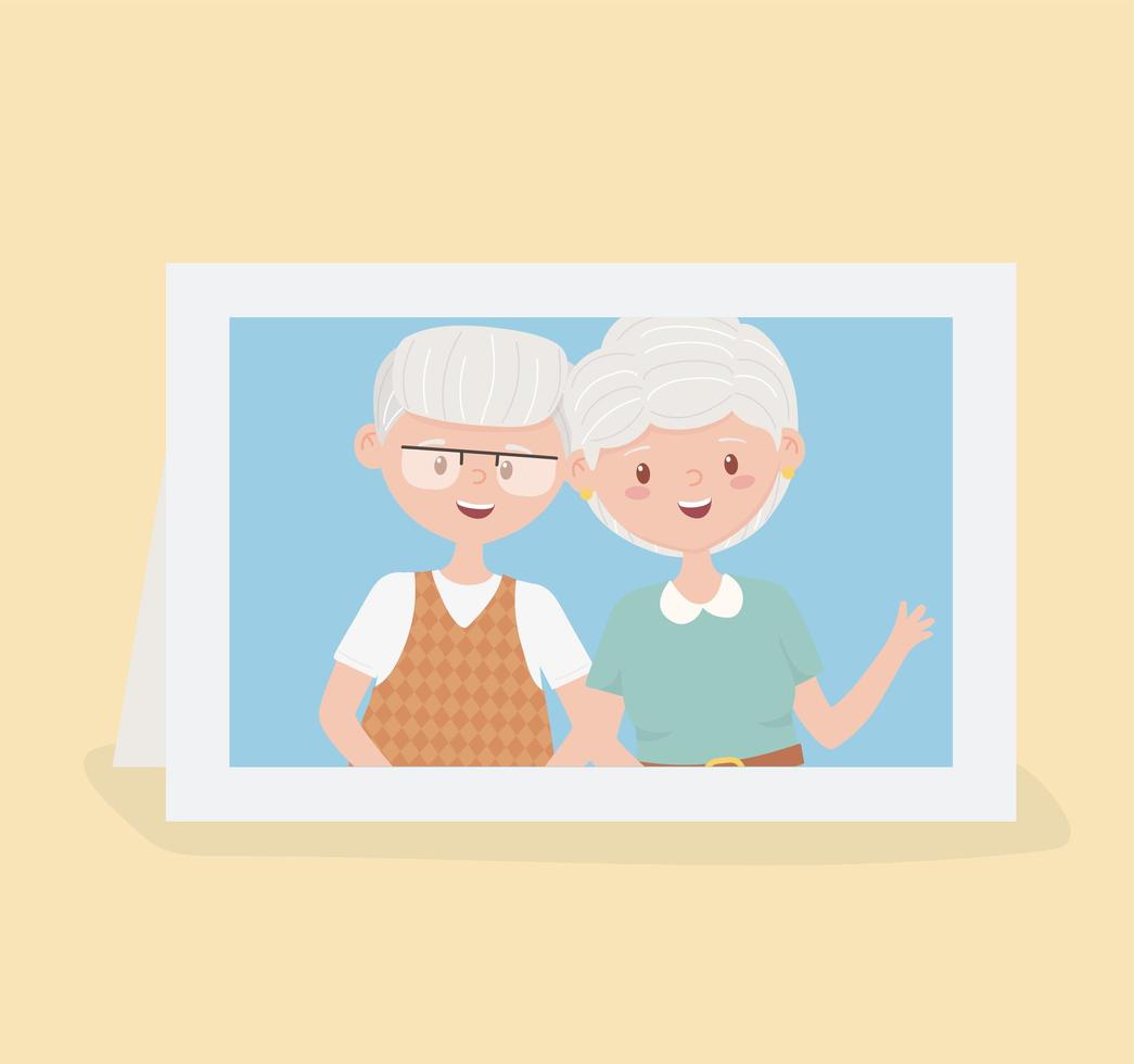 niedliches Seniorenpaar in einem Fotorahmen vektor
