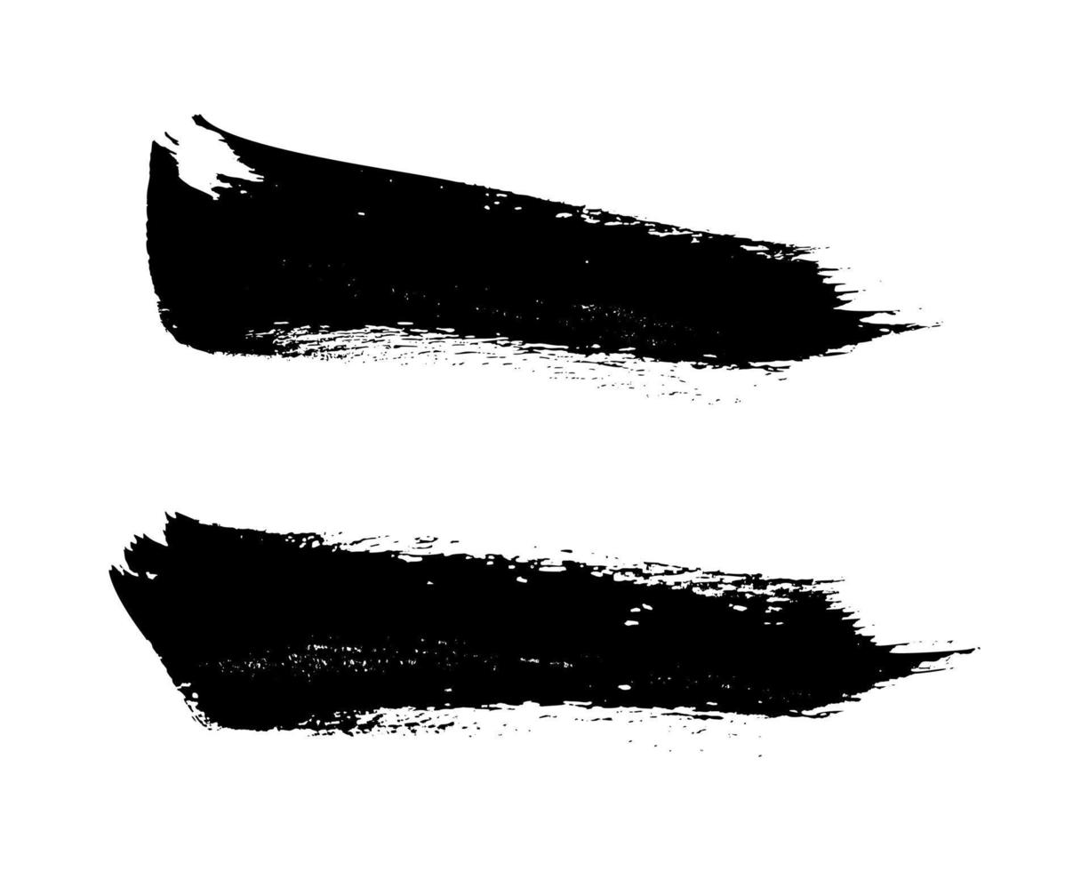 uppsättning av två svart borsta slag. hand dragen bläck fläckar isolerat på vit bakgrund. vektor illustration