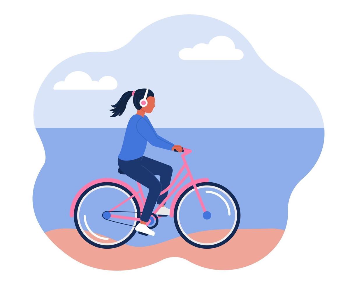 Ein Mädchen mit Kopfhörern fährt mit dem Fahrrad am Strand entlang. das Konzept eines gesunden aktiven Lebensstils. Vektorbild in einem flachen Stil vektor