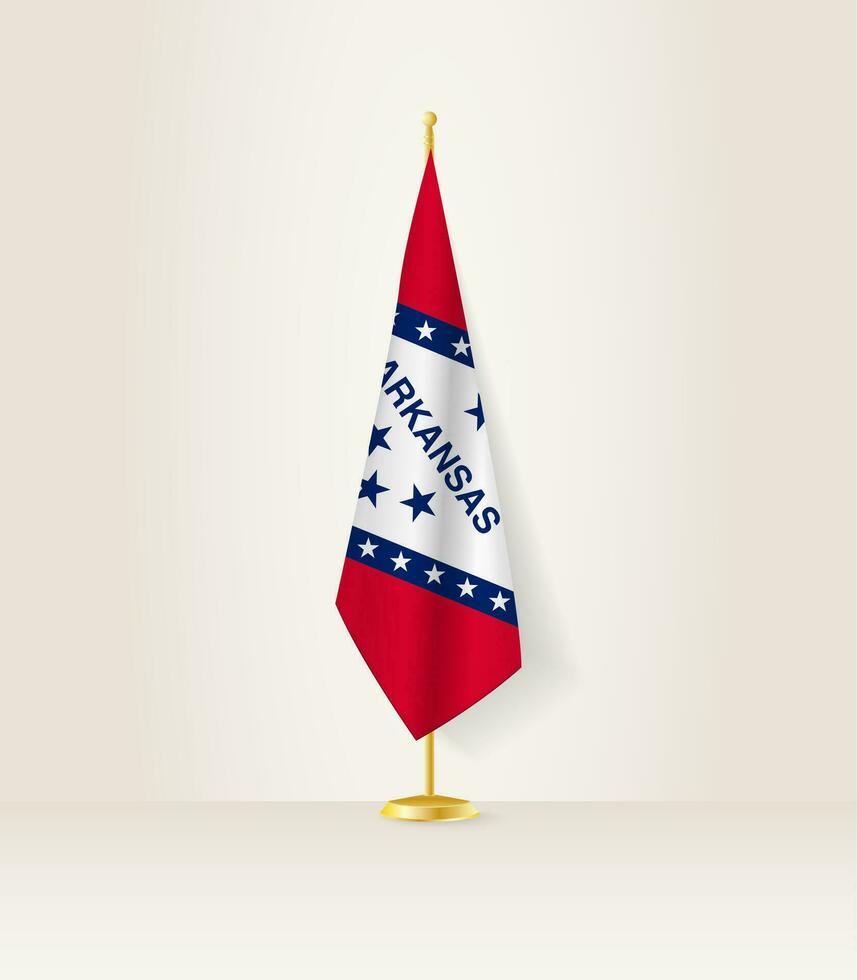 Arkansas Flagge auf ein Flagge Stand. vektor