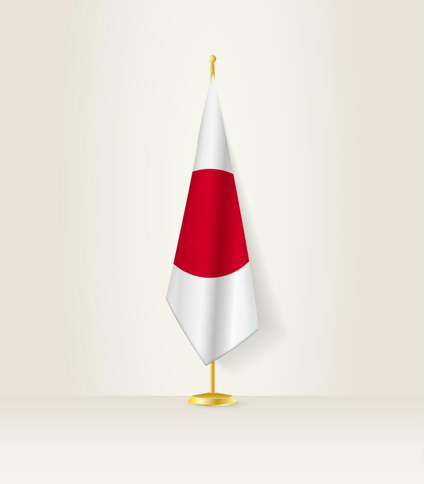 Japan Flagge auf ein Flagge Stand. vektor