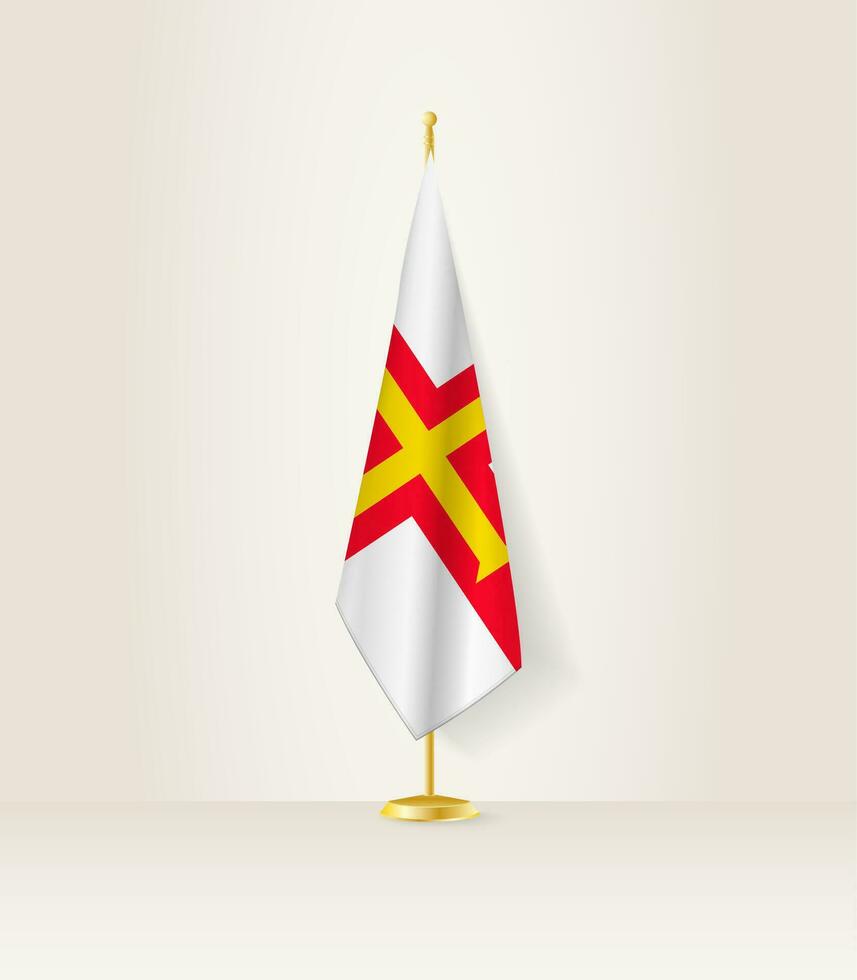 Guernsey Flagge auf ein Flagge Stand. vektor