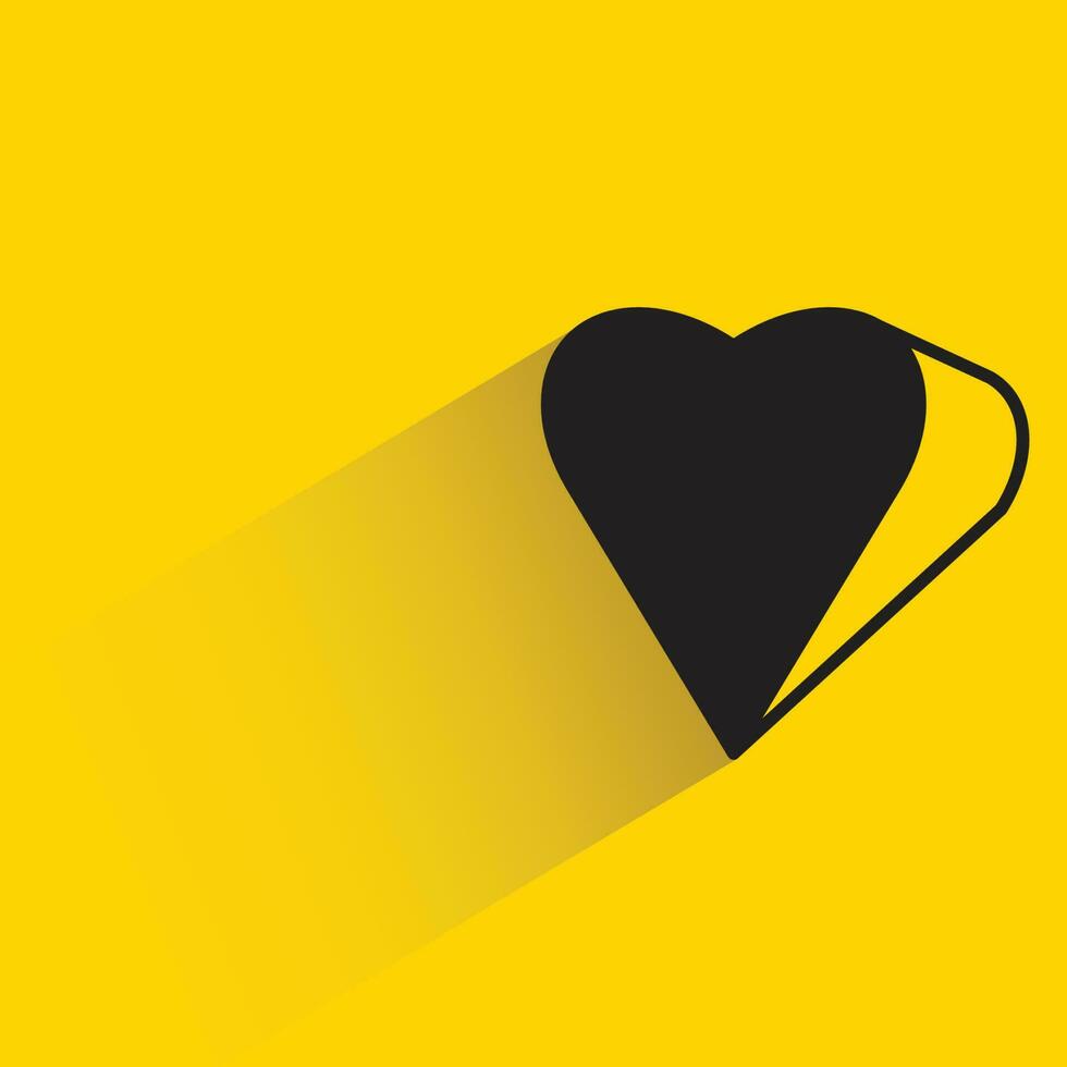 Herz mit Schatten auf Gelb Hintergrund vektor