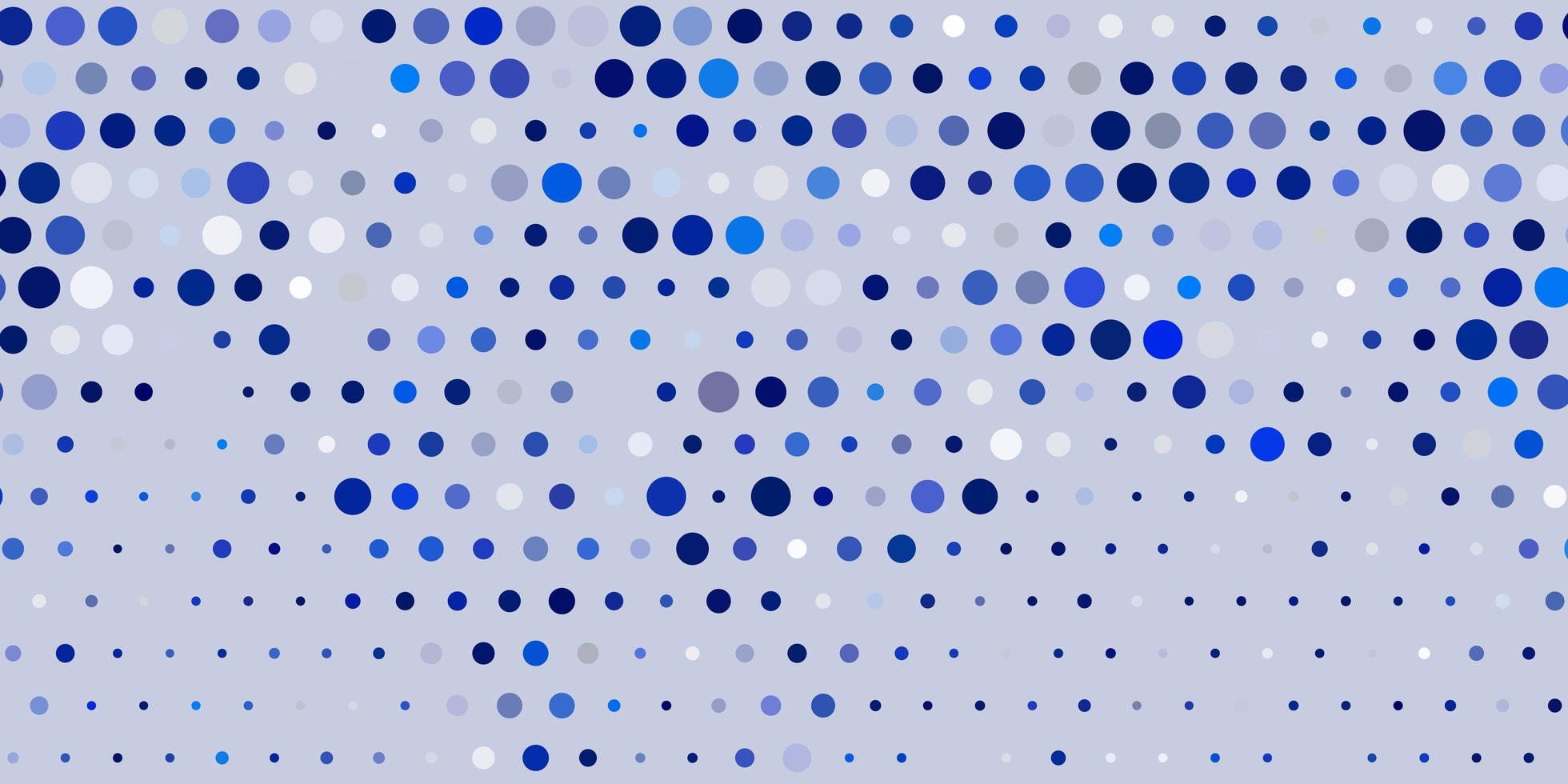 ljusblå vektor mönster med sfärer.