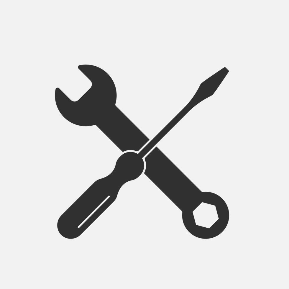 rycka nyckel och skruvmejsel verktyg korsade. svart ikon emblem. vektor illustration