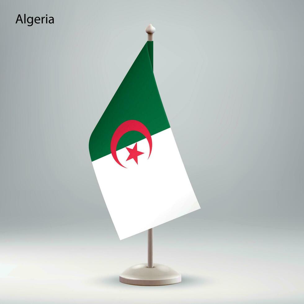 flagga av algeriet hängande på en flagga stå. vektor