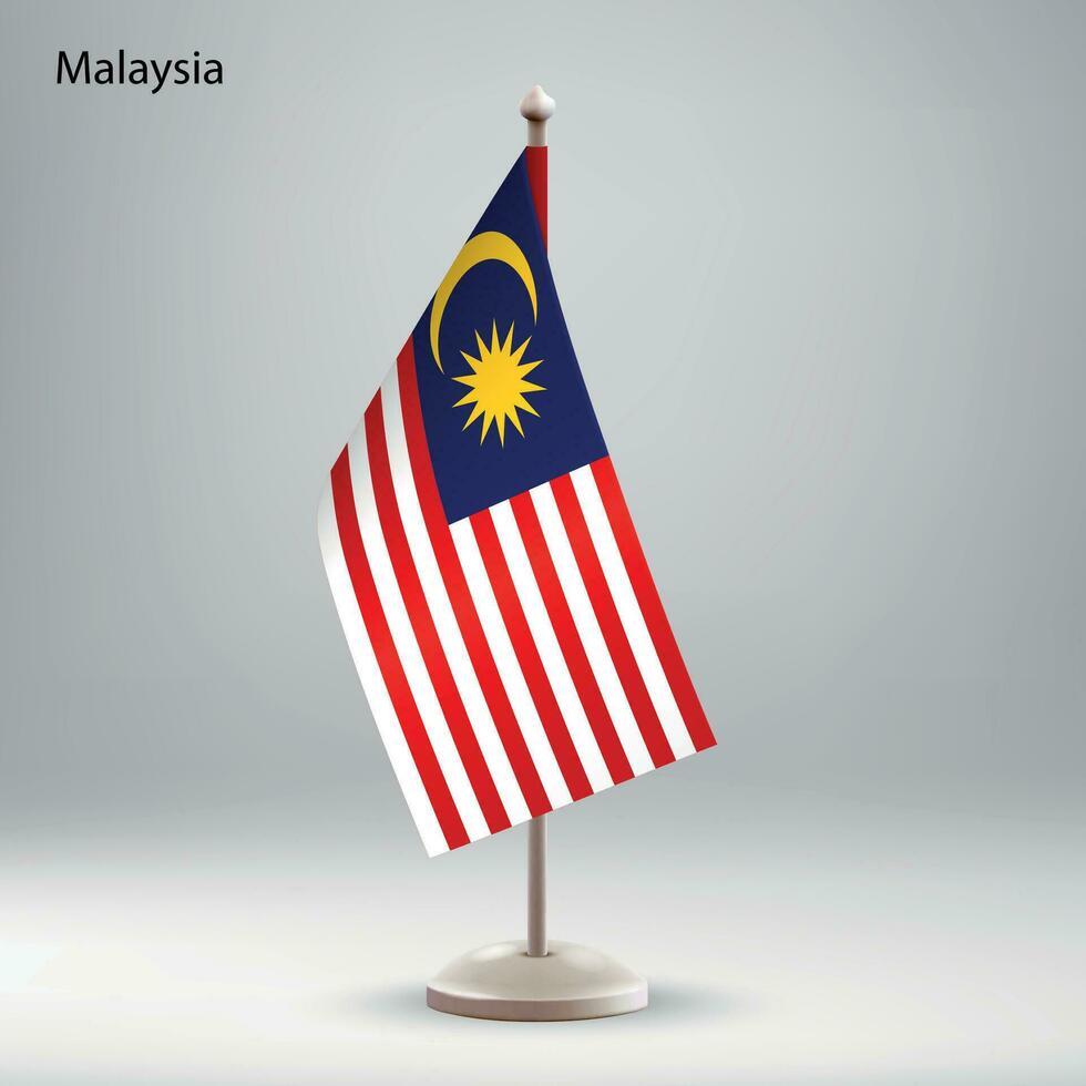 Flagge von Malaysia hängend auf ein Flagge Stand. vektor